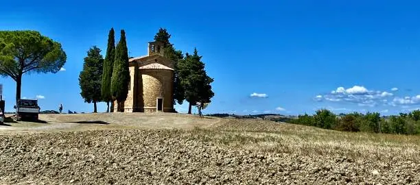 taking a driving tour of san quirico d'orcia, siena, tuscany, italy - september 2021