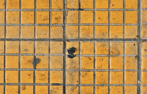istock Detailed close up texture on structured floor tiles on the ground 1365641821