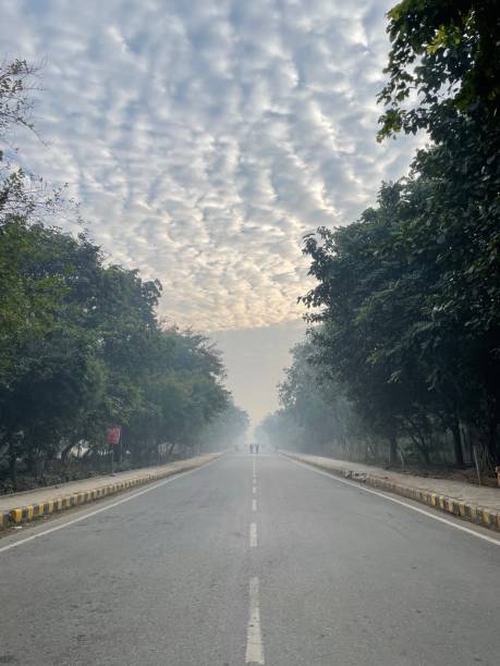 istock City Street in perspective again dramatic cloud 1365642213