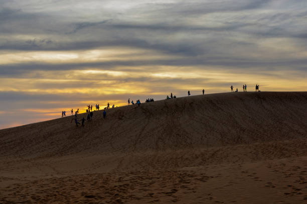 Sunset on the Red sand dunes Photo taken at Mui Ne in the Red sand dunes mui ne bay photos stock pictures, royalty-free photos & images