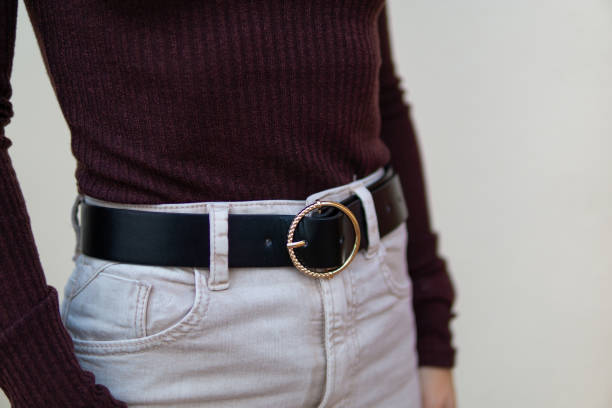 unrecognizable girl with black leather belt - waistband imagens e fotografias de stock