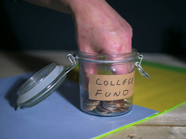 istock Student preparing for college with cash fund 1365644745
