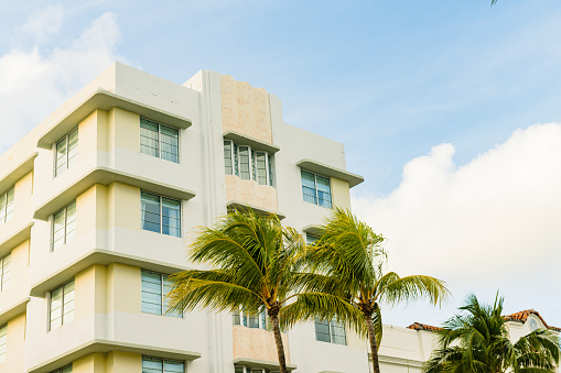 This is an exterior photograph of a Miami Beach Art Deco building in Miami Beach on a winter day in Florida.