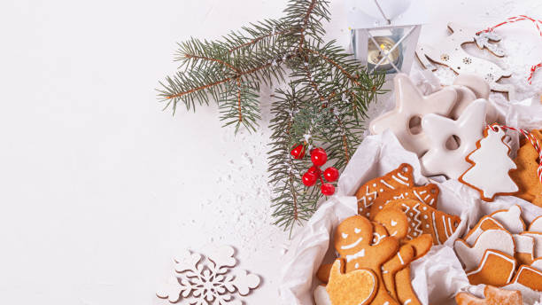 istock Top view of unpacked christmas present with sweets. Christmas celebration concept with space for text 1365649587