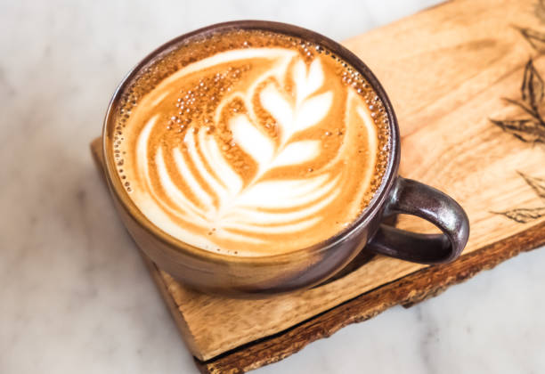 coffee latte top view with leaf shape foam