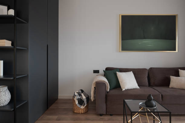 istock Simple and stylish living room with art 1365649831