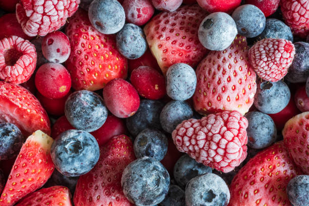 istock frozen mix strawberries blueberries raspberries and cranberries closeup 1365650099