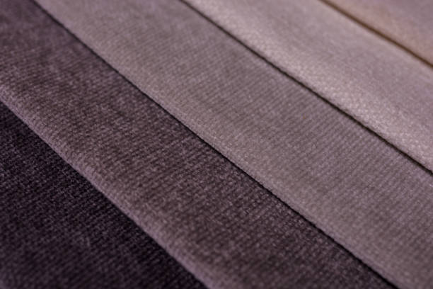 istock Samples of furniture fabrics.Multicolor fabric texture background. Chenille. 1365651195