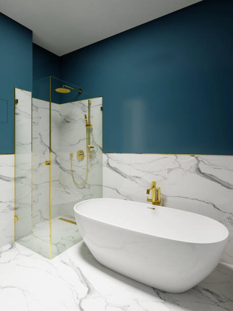 istock A modern white cup-shaped bathtub in the bathroom against a white marble wall. 1365652536