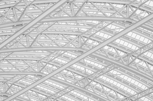 Steel girders supporting glass roof architectural design detail