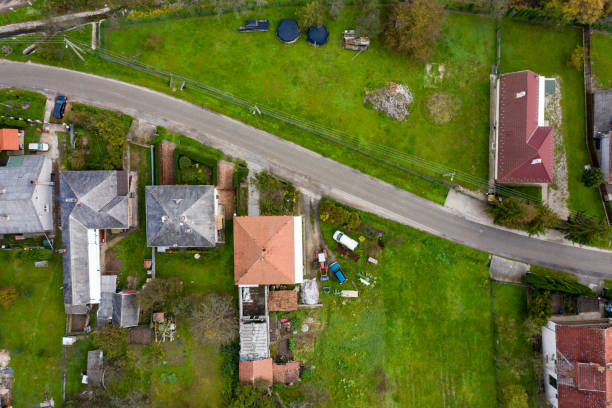 istock Flying over village area in autumn 1365659525