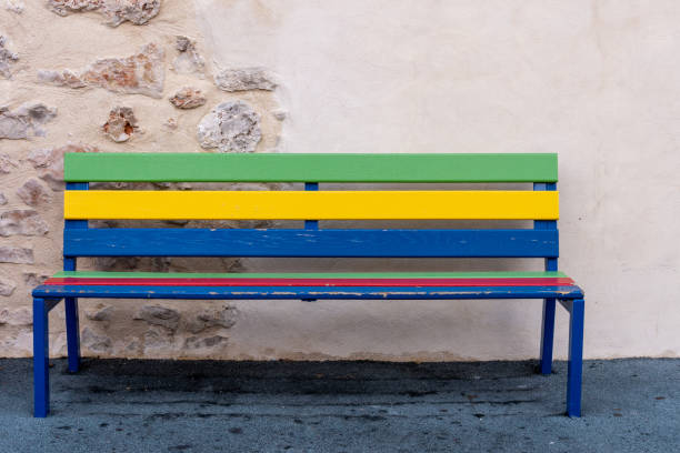 istock painted wooden bench, gay pride concept 1365659668