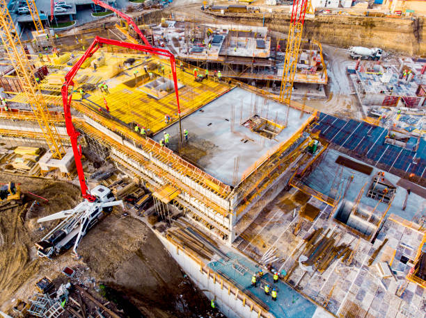 istock High angle view of workers in construction site stock photo 1365659829