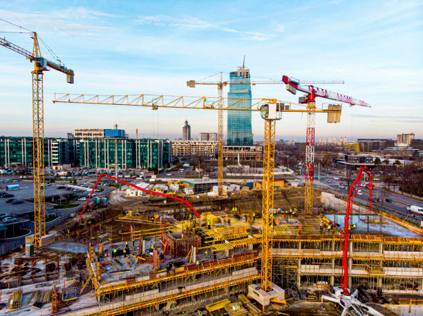 istock High angle view of workers in construction site stock photo 1365659921