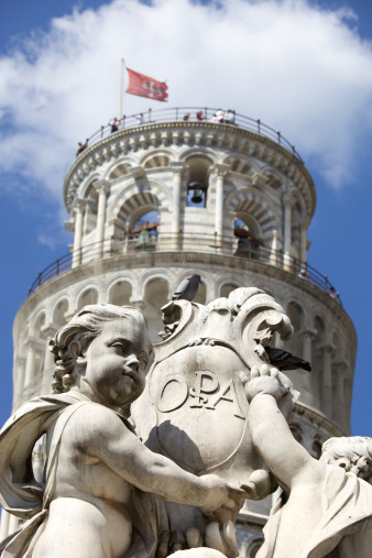 Statue of cherubs near the Leaning Tower of Pisa. Italy