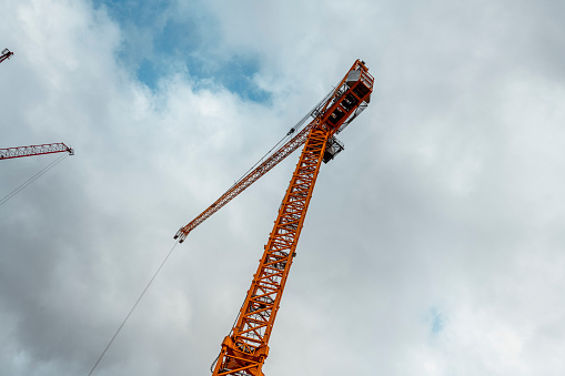 Red crane on a building site