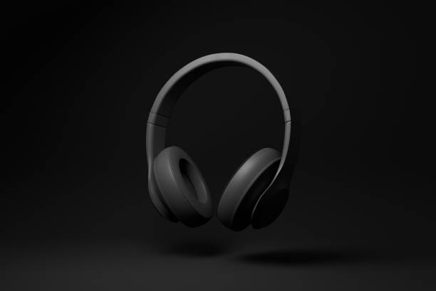 istock Black headphone floating on black background. minimal concept idea. monochrome. 3d render. 1365668285