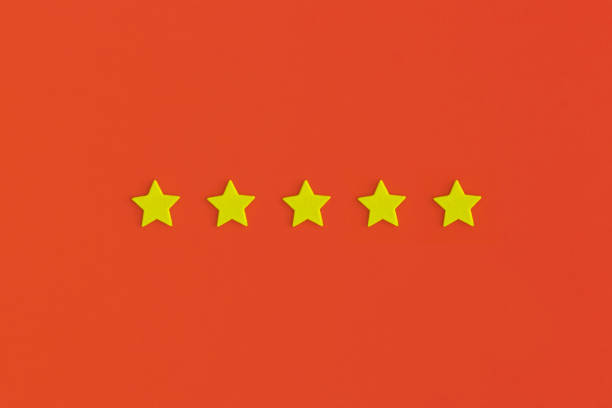 istock Five 5 stars, best excellent services rating on red background. 1365672464