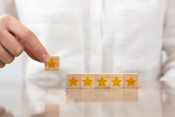 istock starry wooden blocks on a white background. feedback concept. 1365674272