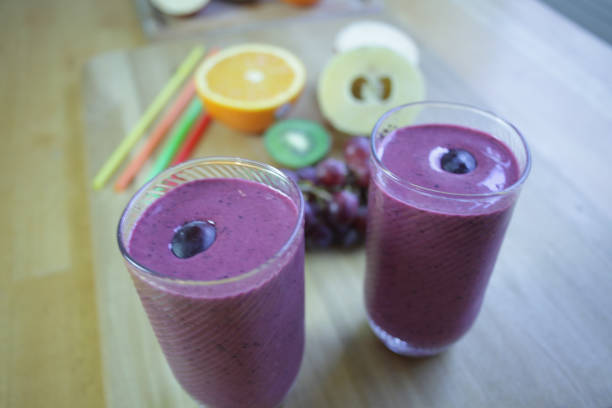 Raspberry, strawberry, cherry, grapes, kiwi smoothie, with a taste of orange fruit.