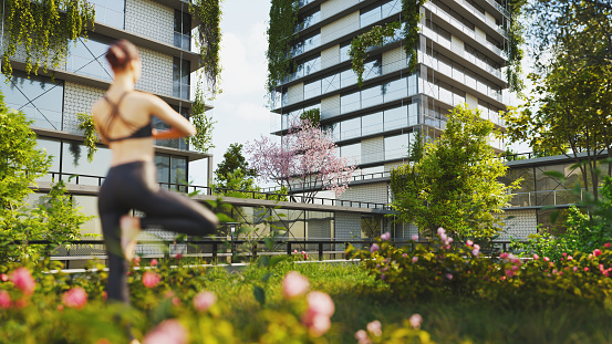 Woman practicing yoga on terrace garden in a sustainable green housing complex. All items in the scene are 3D