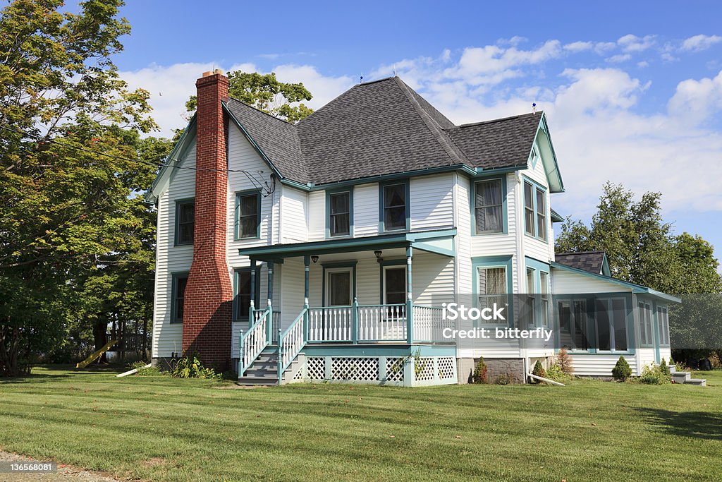 Rural mansion Rural mansion in upstate New York with mowed lawn in front of it Building Entrance Stock Photo
