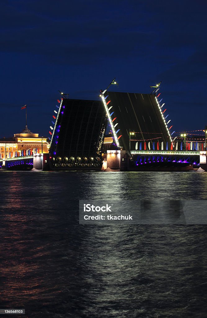 Bridge Night view of raised Palace Bridge in St.Petersburg, Russia. City Stock Photo