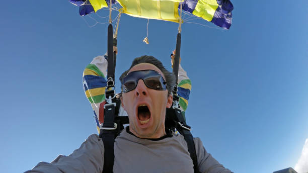 Sky diving selfie tandem jump stock photo
