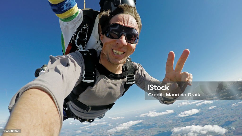 Sky diving selfie tandem jump Human Face Stock Photo