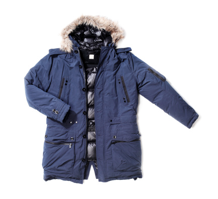 Men's blue down lined winter parka isolated on white with natural shadows.