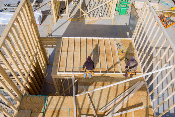 istock Beam stick built frame of new house under construction 1365689180