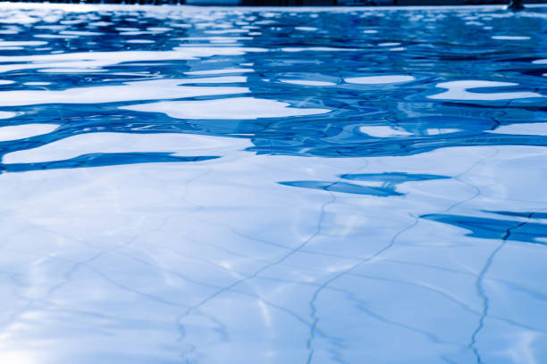 istock Water pool background. Blue wave pool texture, clear water surface. Abstract summer sea pattern. 1365692147