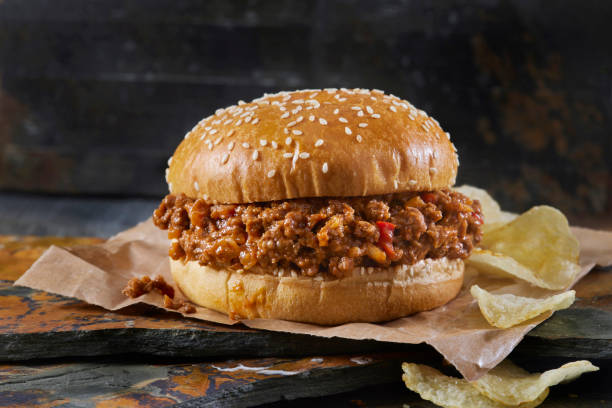 istock Sloppy Joe Burger on a Brioche Sesame Seed Bun with Potato Chips 1365692954