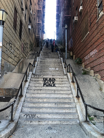 Bronx, New York City, NY, USA. November 1, 2021. The Joker Stairs Film Location in Highbridge in The Bronx, for the Joker movie. Looking up from Shakespeare Avenue.
