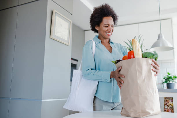 istock Carrying groceries from the supermarket 1365704626