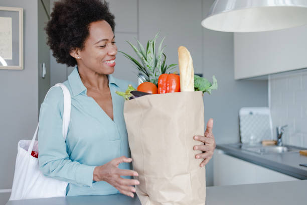 istock Carrying groceries from the supermarket 1365704710