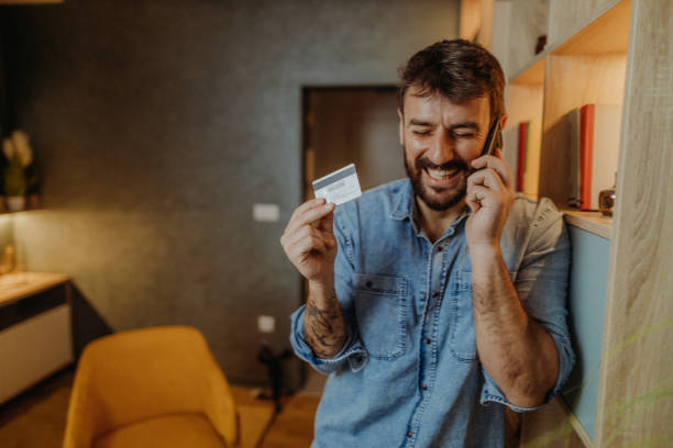 istock Man shopping online 1365707379