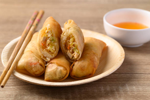 Asian deep fried spring roll filling with tofu, cabbage, carrot and glass noodle stock photo
