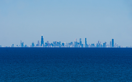 Distant view of Chicago Skyline over Lake Michigan from Indiana Dunes State and National Park