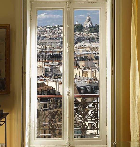 istock Window on the roofs of Paris 136573414