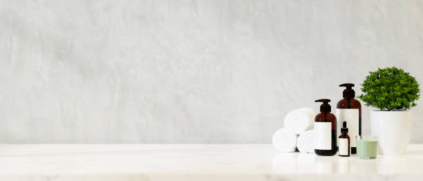 istock Minimal organic lotion and serum brown glass bottles and decor on a tabletop. 1365735721