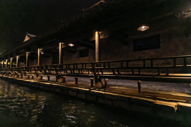 istock Chinese retro style architecture. Classical garden. Gubei water town night view 1365738163