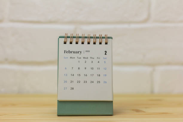 istock Desktop calendar for February 2022 on a light background. 1365741181