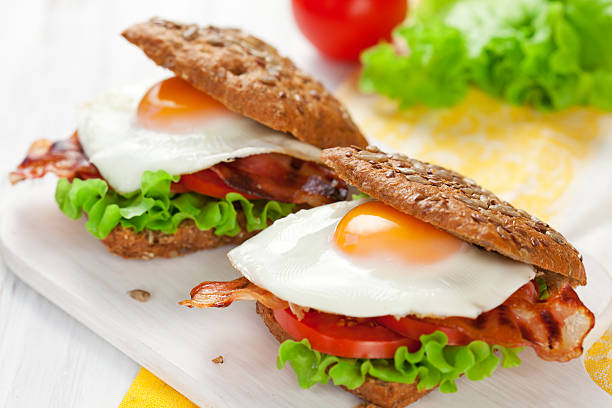 istock wholemeal sandwich with fried egg and bacon 136574197
