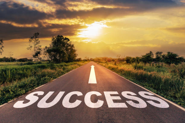 istock Success text on the highway road concept for planning and challenge or career path, business strategy in sunset background. 1365744030