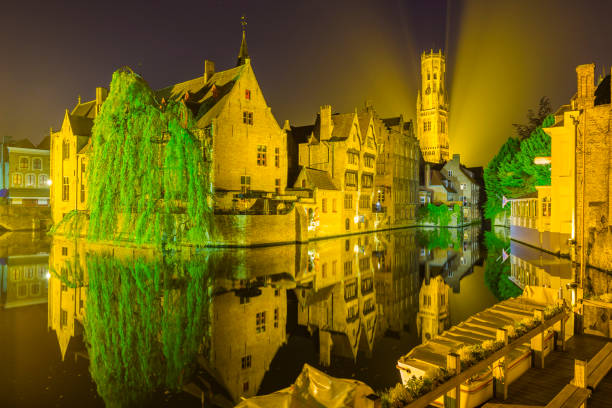 Dijver canal and the Belfry of Bruges in the city of Bruges, Belgium