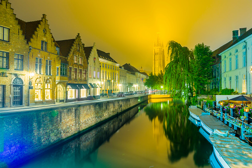 Dijver canal and the Belfry of Bruges in the city of Bruges, Belgium