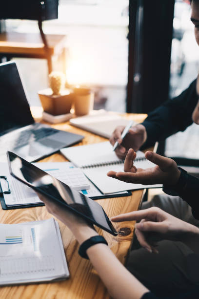 istock Group of Business and Accountant checking data document on digital tablet for investigation of corruption account . Anti Bribery concept. 1365748325
