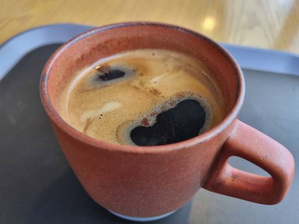 istock A cup of warm coffee in the winter. 1365749147