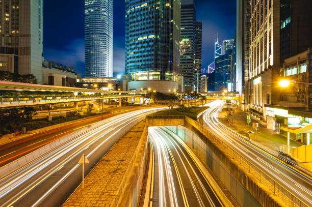 vista notturna di hong kong - hong kong night motion city foto e immagini stock